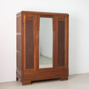 Vintage spiegelkast met houtsnijwerk